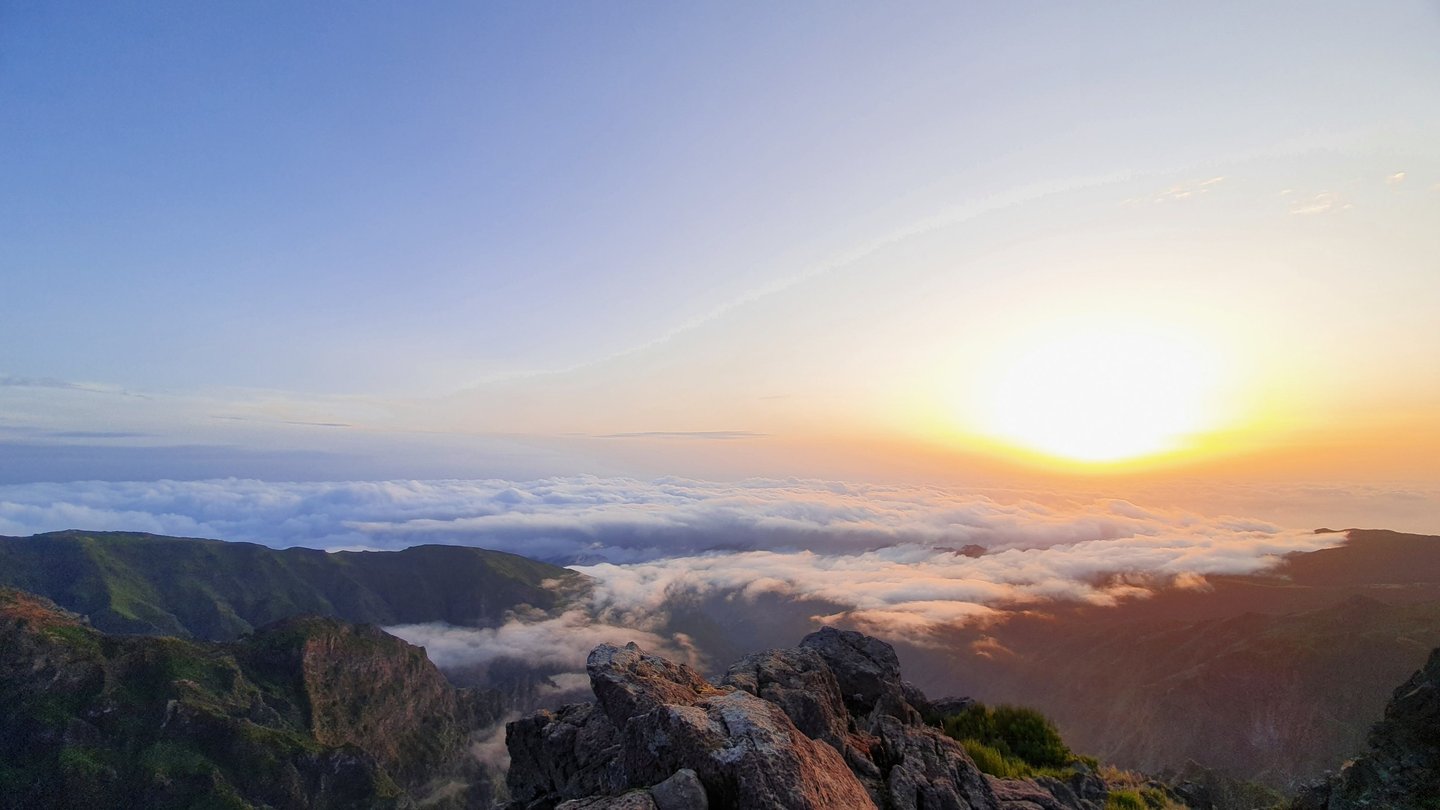 Sunrise over a sea of clouds from the Pico do Arieiro ridge, Madeira
